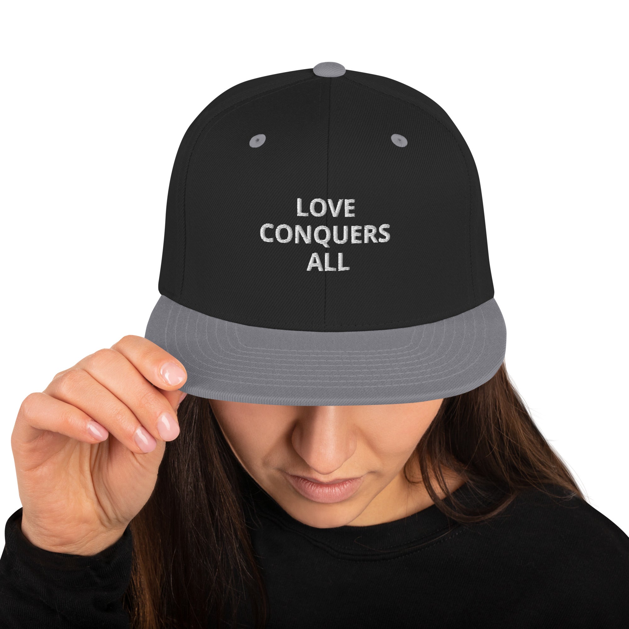 “Love conquers” Snapback Hat