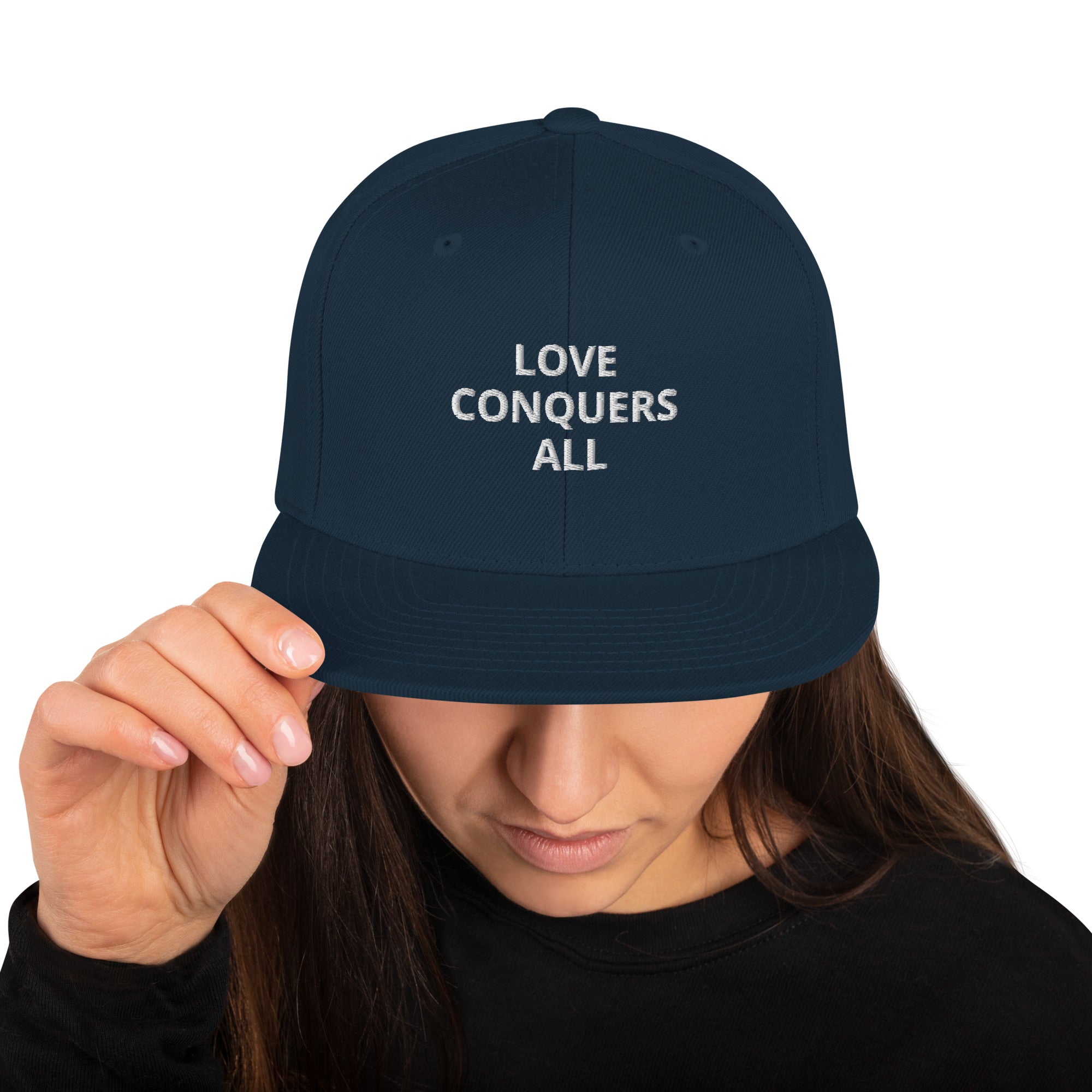 “Love conquers” Snapback Hat