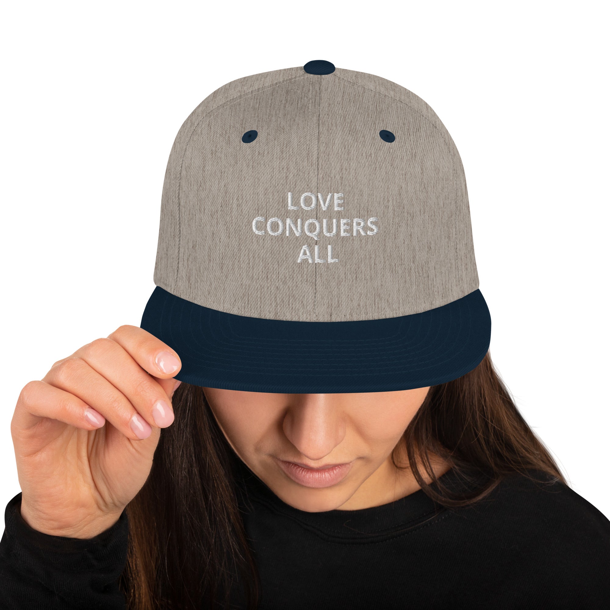 “Love conquers” Snapback Hat