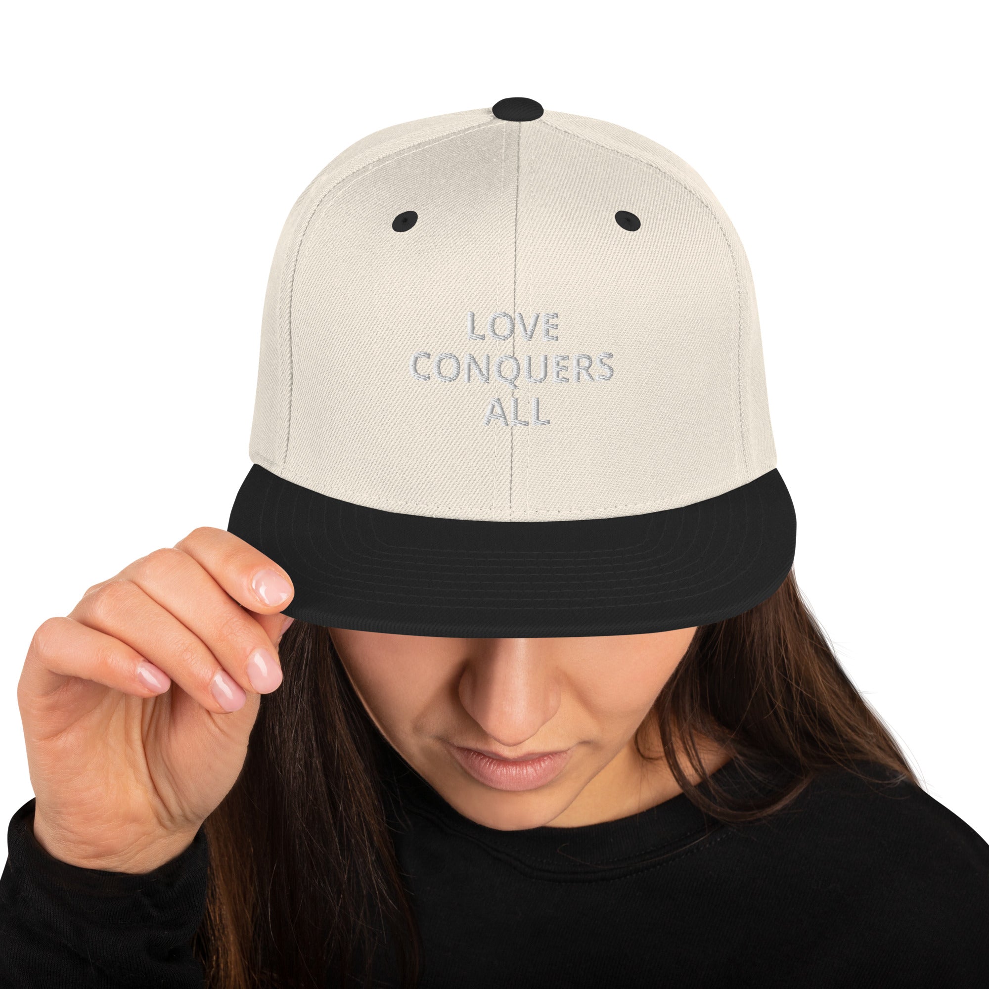 “Love conquers” Snapback Hat