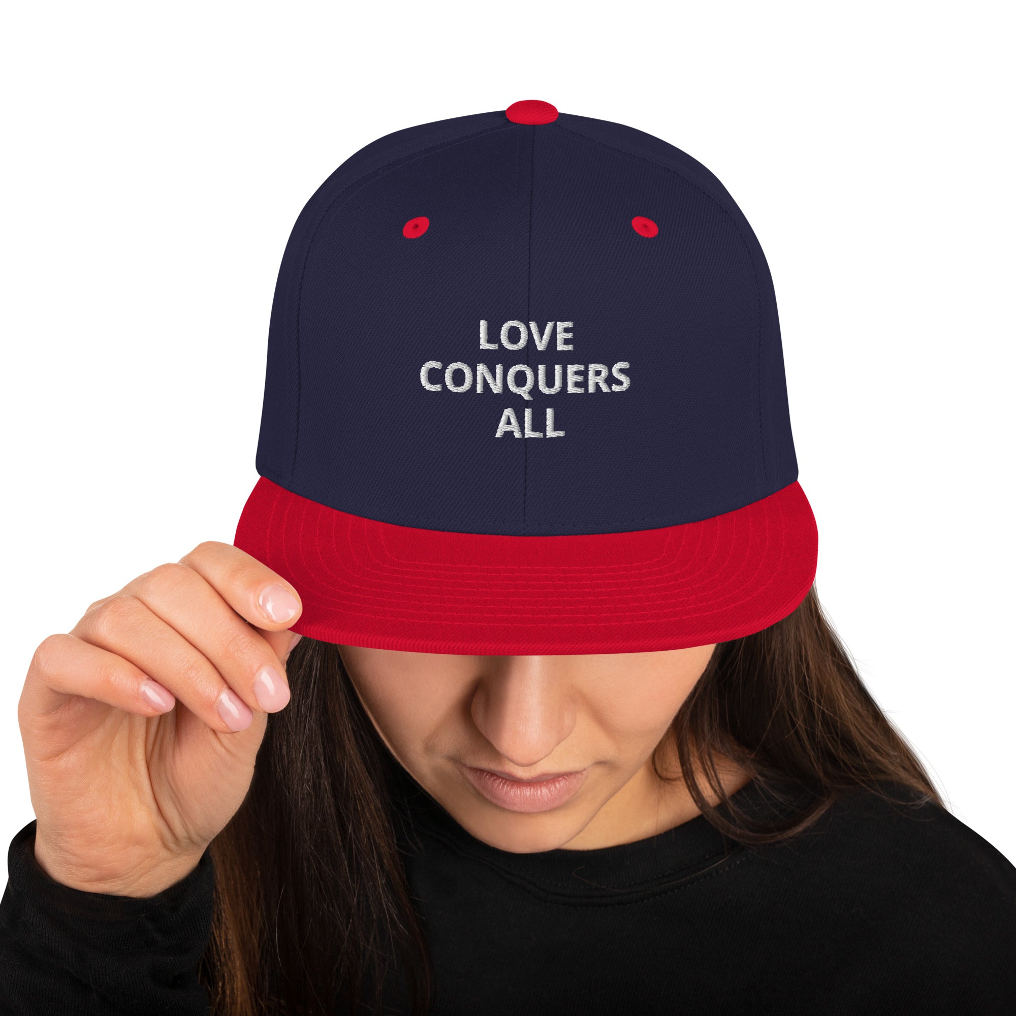 “Love conquers” Snapback Hat