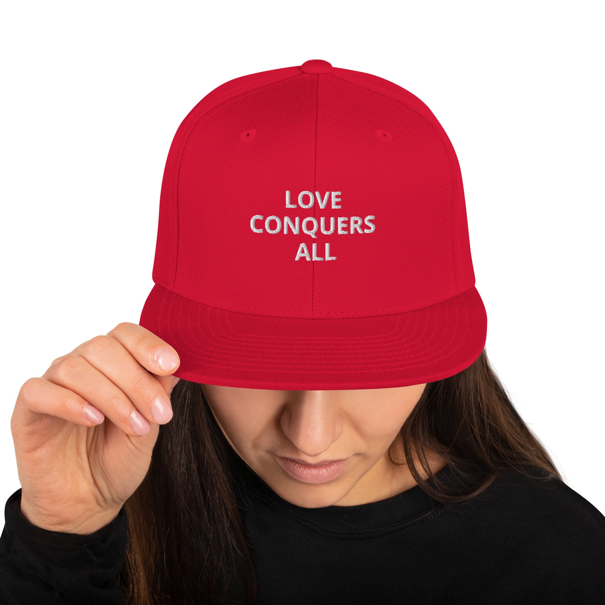 “Love conquers” Snapback Hat