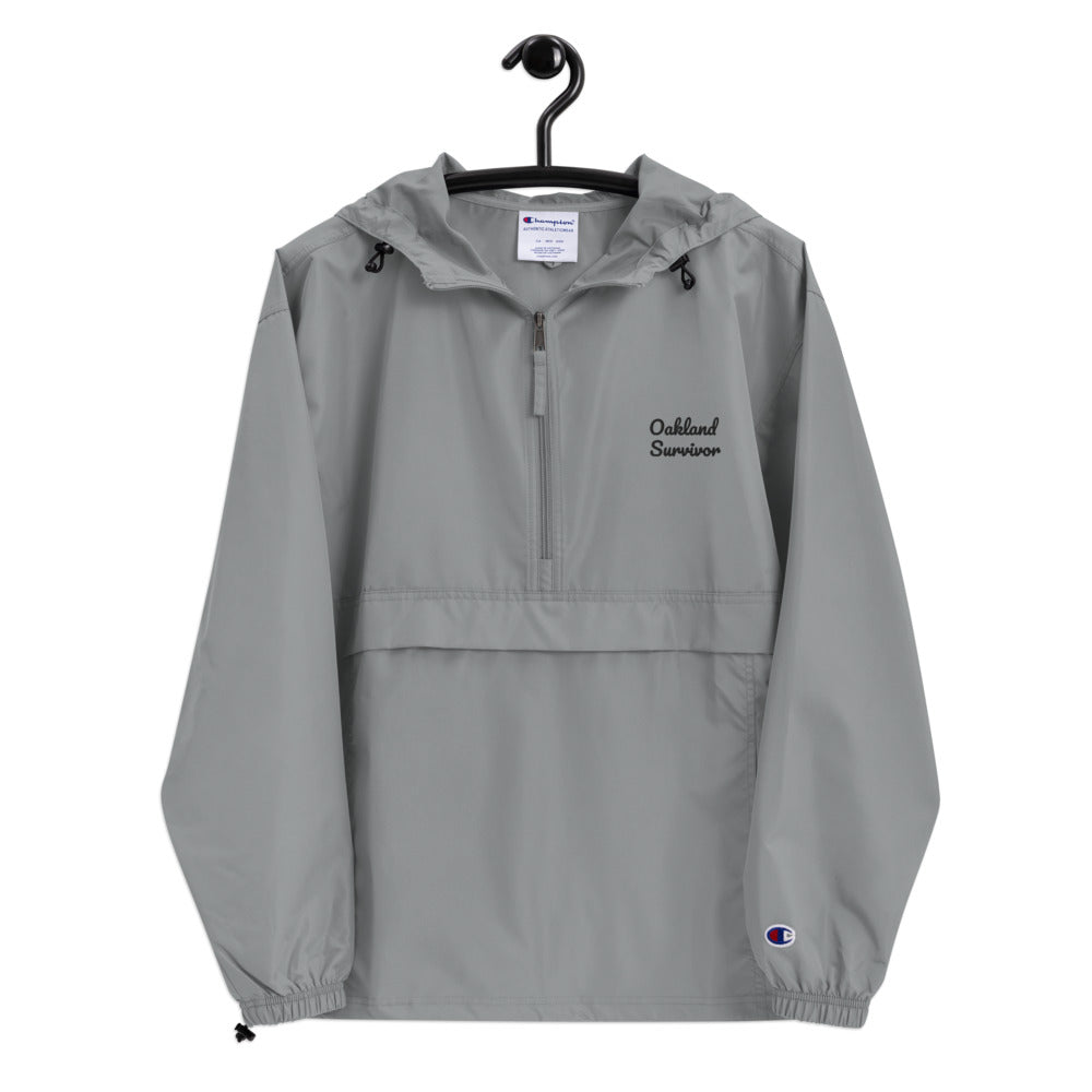 Embroidered “Oakland Survivor”  Champion Packable Jacket