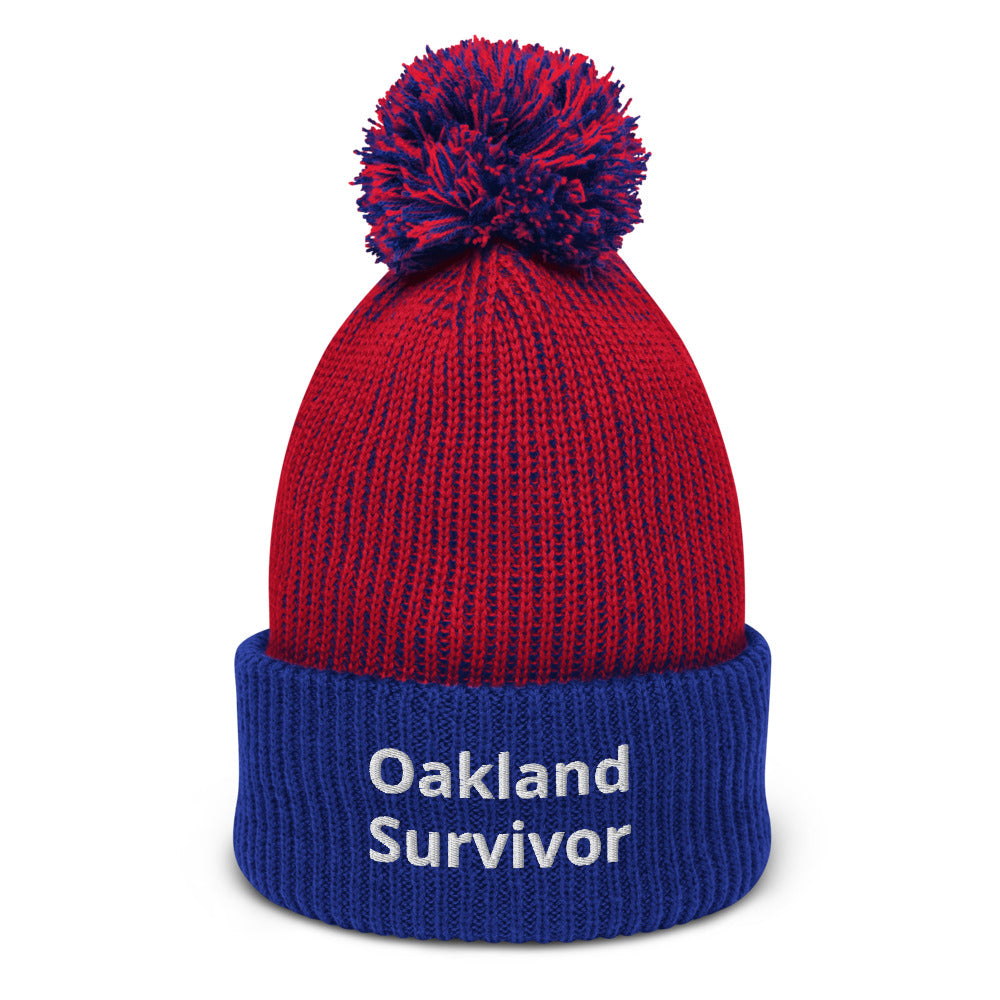 Pom-Pom “Oakland Survivor” Beanie